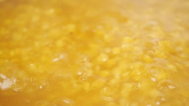 cooking dhal in hot water slow motion 