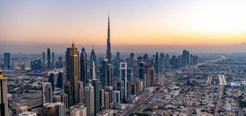 Fototapeta na wymiar Aerial view of Dubai Downtown at sunset UAE