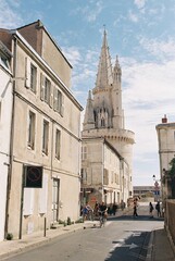 Naklejka premium Rue des Fagots and La Tour de La Lanterne, La Rochelle, France.