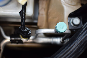 Linea de Carga para Aire acondicionado Automotriz.