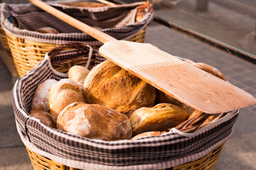 readymade rolls of freshly baked cereal bread in basket