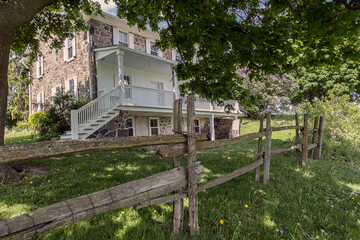 old house with a wooden fence