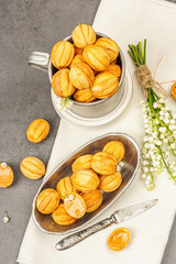 Cookies in the shape of walnuts with condensed milk cream filling.Delicious shortbread sandwiches