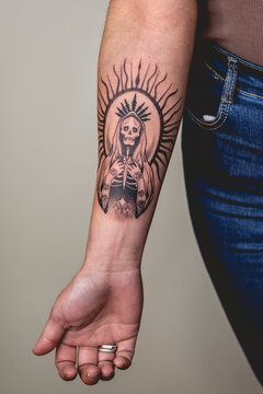 Detail Of New Tattoo Of 'La Santa Muerte' (Our Lady Of Holy Death) In The Arm Of A Woman