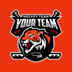 Tiger head logo for the ice hockey team logo. vector illustration. With a combination of shields badge, puck and ice hockey stick