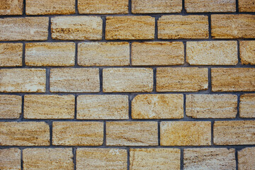 Limestone tiles wall texture background.