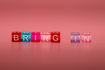 the word "bring in" made up of cubes