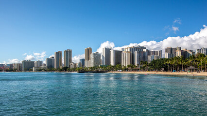 Naklejka premium Ocean Water, Waikiki Beach, and Hotel Towers