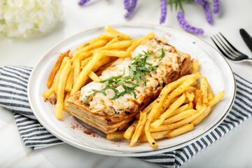 LE VOL Au VENT french puff pastry filling with chicken, cream and fries served in a dish isolated...