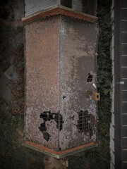 Old generic derelict industrial buildings in a dilapidated state aerial view