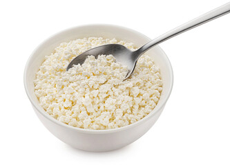 Bowl of cottage cheese with spoon isolated on white background