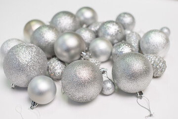 A set of silver Christmas tree toys and decorations for the holiday