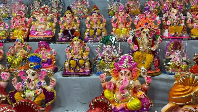 For Ganesh Chaturthi, multiple Lord Ganesha idols are displayed for sale in a stall by the side of the street in Kolkata.
