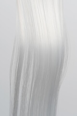 White shiny hair strands