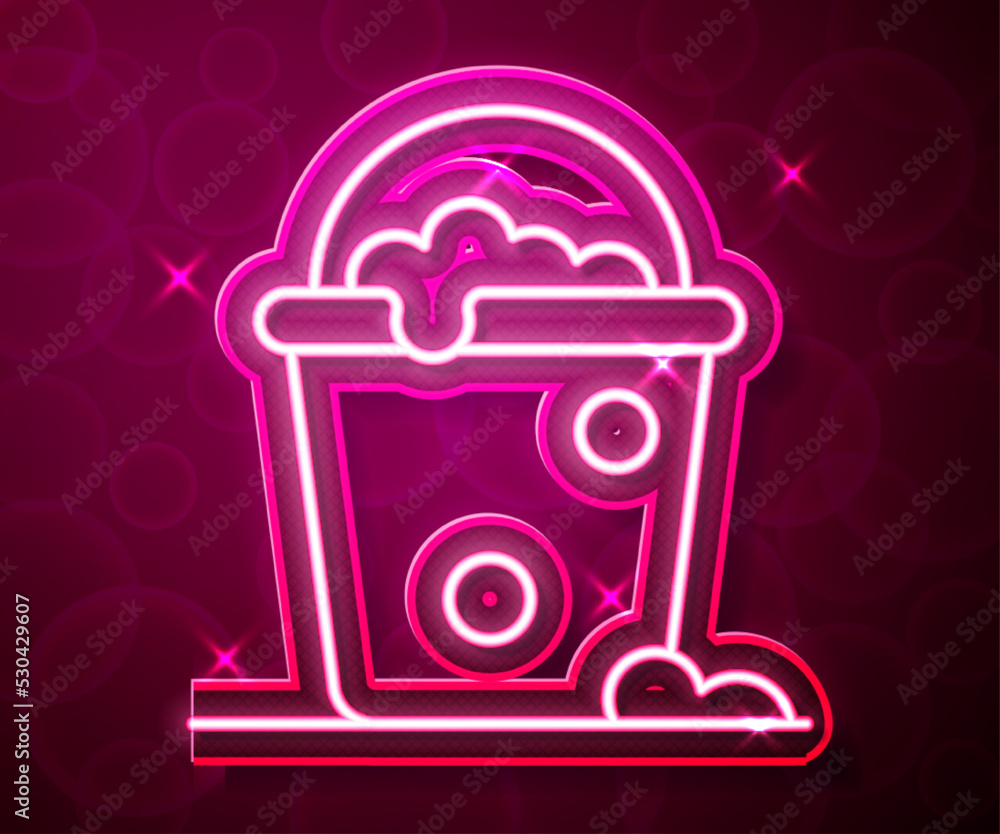 Poster Glowing neon line Bucket with foam and bubbles icon isolated on red background. Cleaning service concept. Vector