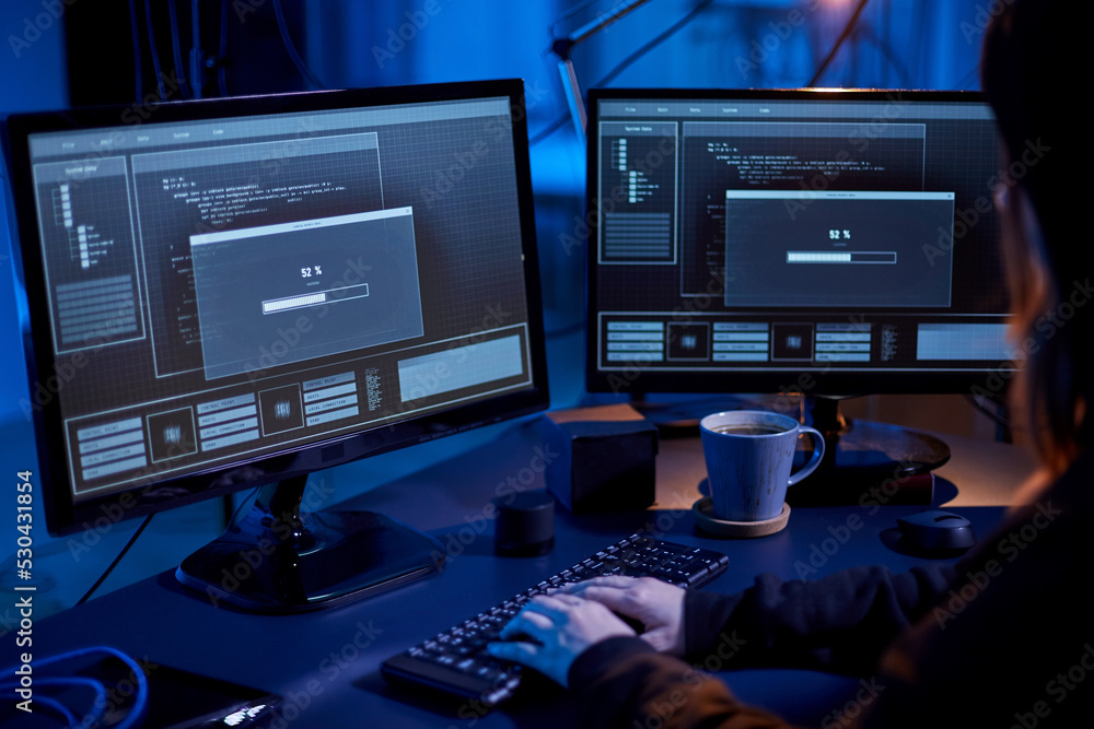 Poster cybercrime, hacking and technology concept - close up of female hacker in dark room writing code or 