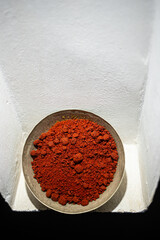 Red Arabian tasty spice in a round plate
