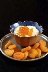 Malabie, classic Arabic dessert with cream, sugar and apricots