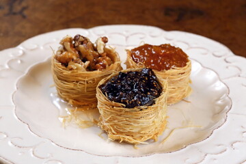 sweet Syrian nest of blueberry, almond and apricot jam