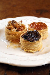 sweet Syrian nest of blueberry, almond and apricot jam