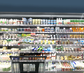 Choosing food from shelf in supermarket,vegetables in grocery section,Grocery stores ,empty grocery cart in an empty supermarket