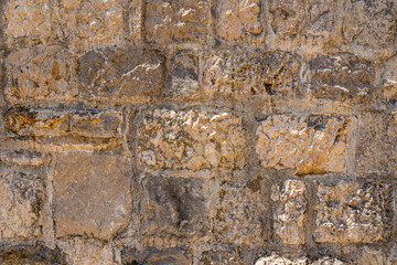 Old stone wall. Vintage stonework background