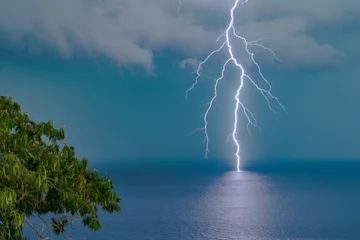 Fotobehang Lightning portrait over the sea in Lesvos, Greece. Full Power © Andrea