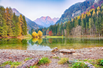 Picturesque view  of  lake Plansar Lake or Plansarsko jezero on valley Zgornje Jezersko in autumn.