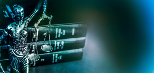 Legal law concept image - gavel and books on desk - cool tone.
- 530441200