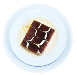 top view of caramel trilece dessert served on plate. Trilece Dessert made by sugar, egg, vanilla, powder, milk