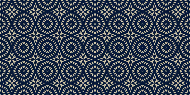 Vector ornamental seamless pattern in traditional arabian, moroccan, turkish style. Golden abstract mosaic background texture with stars, floral shapes. Gold and blue ornament. Premium repeat design