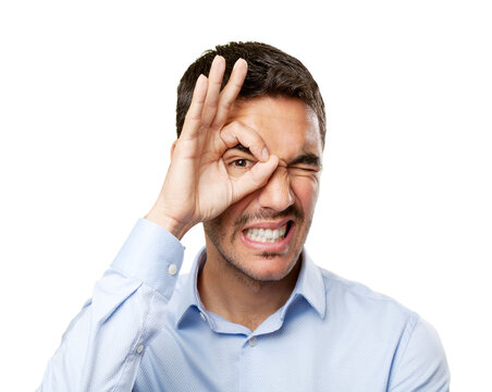 Portrait of a young man gesturing and smiling
