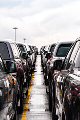 imported Cars lined up at the Port of Southampton, United Kingdom after coming off the car carrier ship 