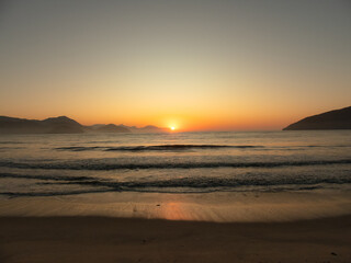 Watch the sunrise on the Beach