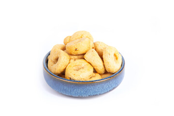 Tarallini or Taralli an Italian Snack Ring or Cracker Isolated on White in a Blue Pottery Bowl in a Three Quarter or Side View Shot