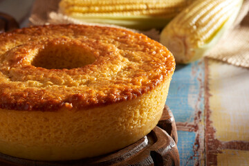 Homemade round cake made of green corn and cheese, known as 