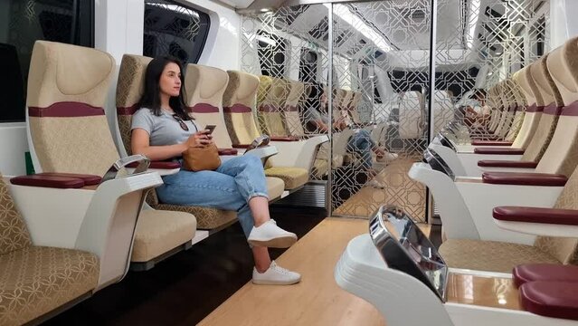 Woman tourist at subway in train at Doha Qatar
