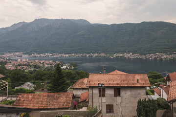 High angle view of the town of Brolo, Piedmont, Italy. On the background lay Orta lake and the city of Omegna. Copy space.