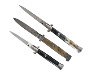Three old switch blade knives isolated.