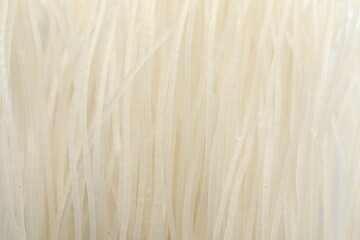 Closeup view of dried rice noodles as background