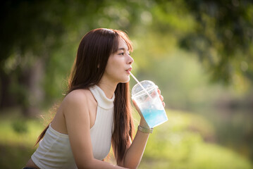 Portrait of a beautiful  woman at park