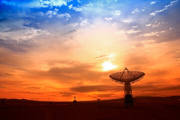The silhouette of a radio telescope observatory - obrazy, fototapety, plakaty