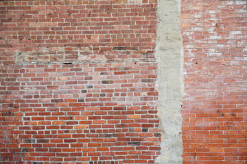 facade view of old grunge brick wall background