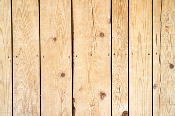 Structure of a wooden unpainted fence. Close-up. High quality photo