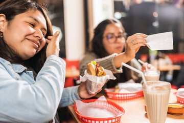 Friends enjoying mexican food in a restaurant
