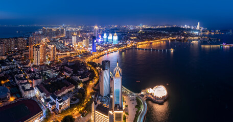 Fototapeta na wymiar Aerial photography night view of modern city buildings in Qingdao, China
