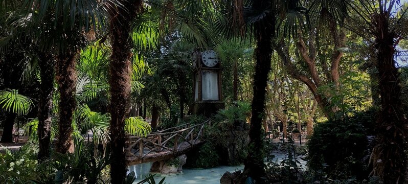 Water Clock in Rome, in between lots of Trees