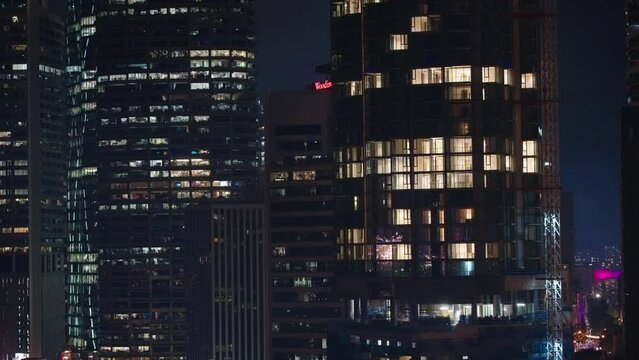 Bright Firework Show Reflecting In Brisbane Skyscraper Buildings During Riverfire Night, 4K Slow Motion
