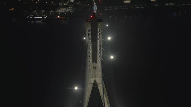 A beautiful camera shot reveals the splendour of the Świętokrzyskie Bridge structure. A top-down cinematic shot in motion