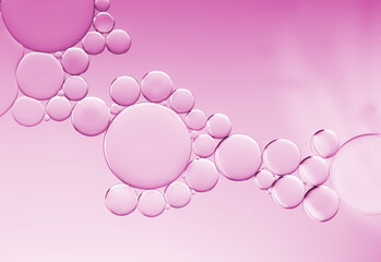 Pink gradient oil and water  bubbles on  background.